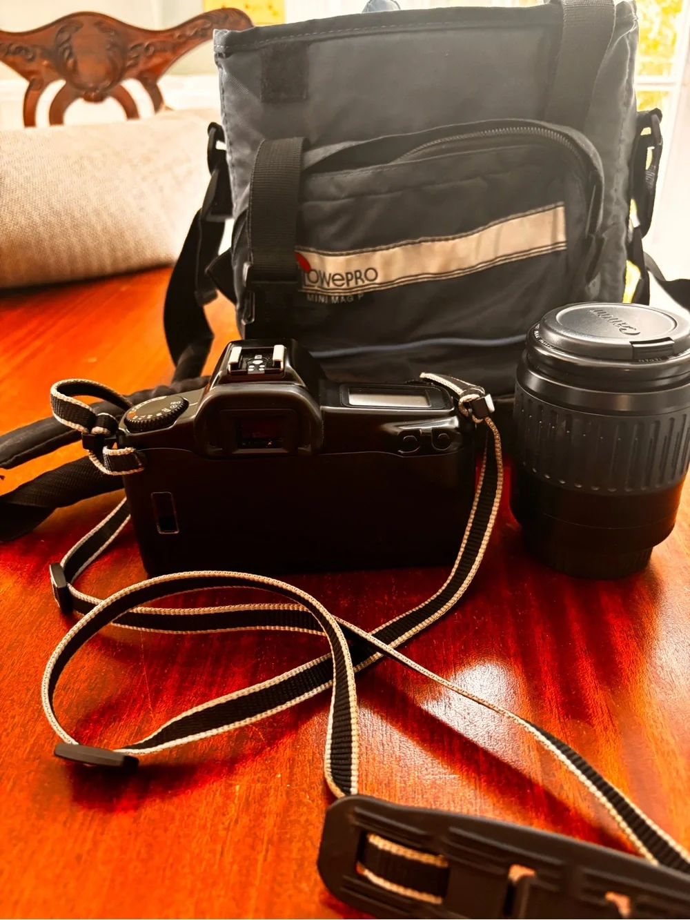 Canon EOS Rebel DSLR Camera Body with strap,80-200 Zoom Lens, bag and film